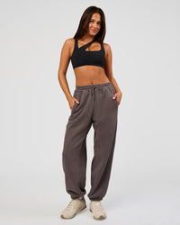 Woman wearing Distort Oversized Slouchy Fit Track Pant - Duskstone Washed | Model:Bianca | Size:XS