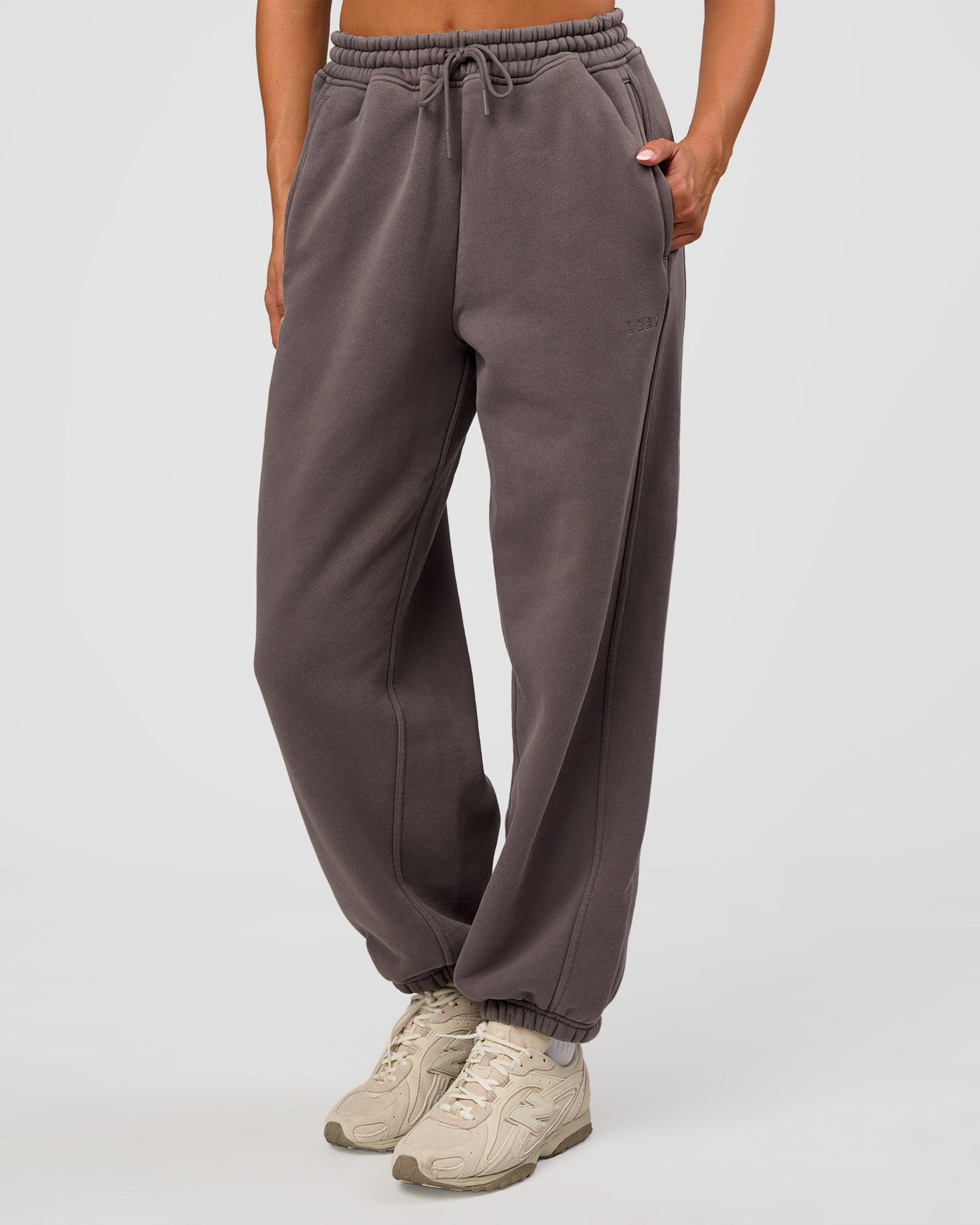Woman wearing Distort Oversized Slouchy Fit Track Pant - Duskstone Washed | Model:Bianca | Size:XS