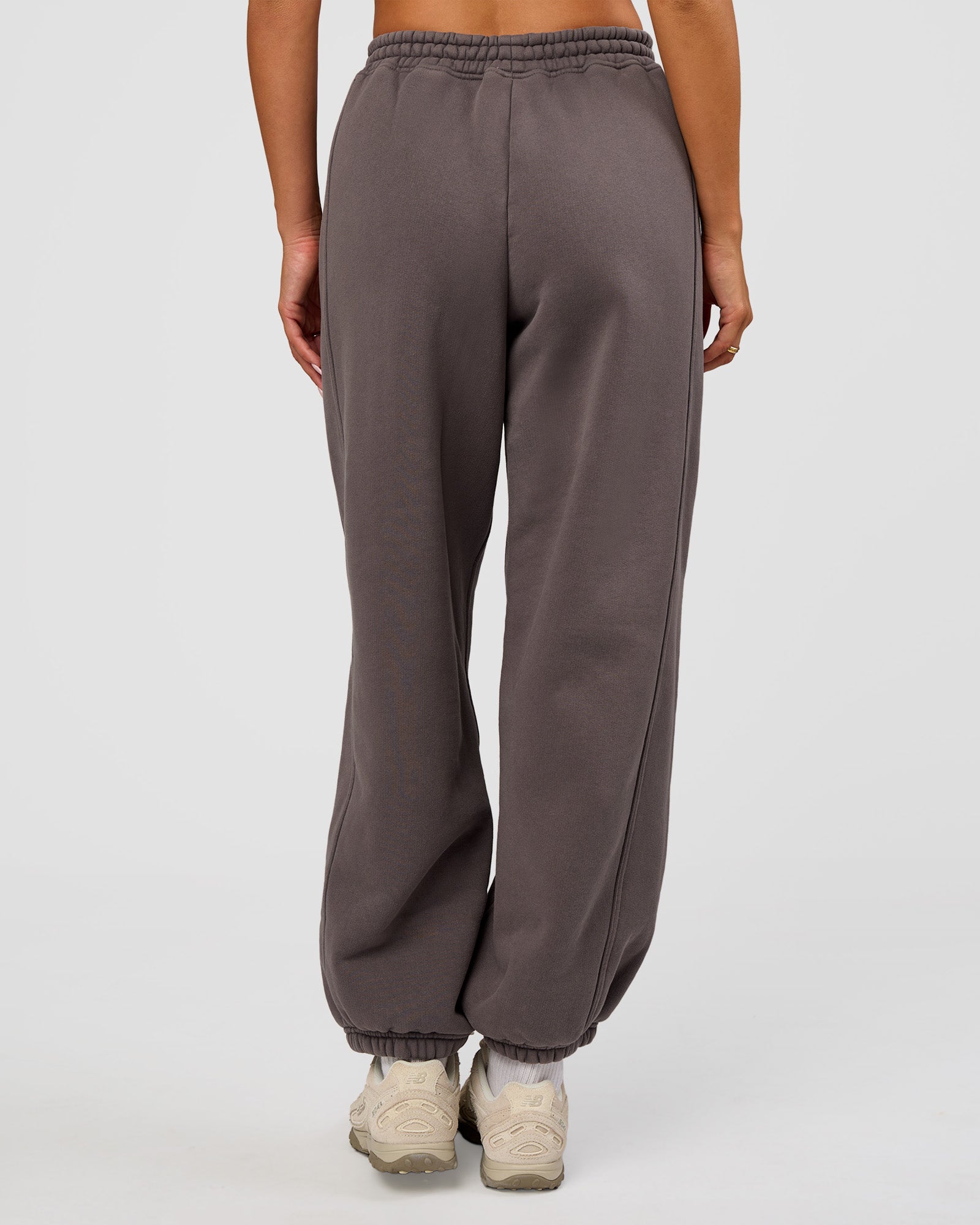 Woman wearing Distort Oversized Slouchy Fit Track Pant - Duskstone Washed | Model:Bianca | Size:XS
