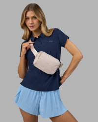 Woman wearing Drive Polo - Future Navy | Model:Leilani | Size:XS | Thumbnail Index: 4
