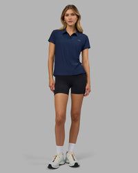 Woman wearing Drive Polo - Future Navy | Model:Leilani | Size:XS | Thumbnail Index: 5