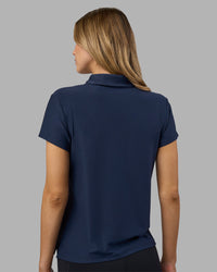 Woman wearing Drive Polo - Future Navy | Model:Leilani | Size:XS | Thumbnail Index: 3