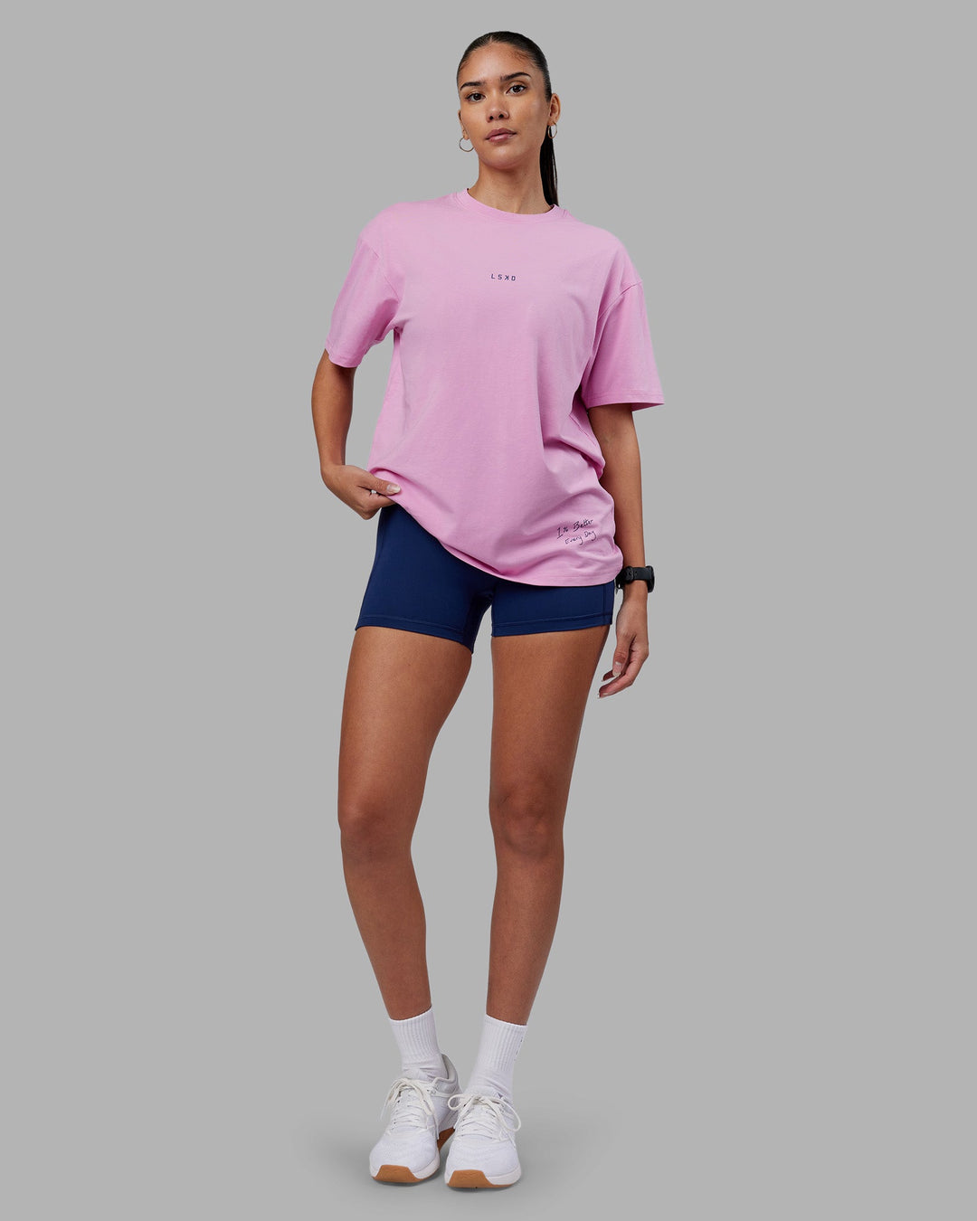 Woman wearing ETJ Values FLXCotton Oversize Tee - Bubblegum-Indigo | Model:Rhiley | Size:XS