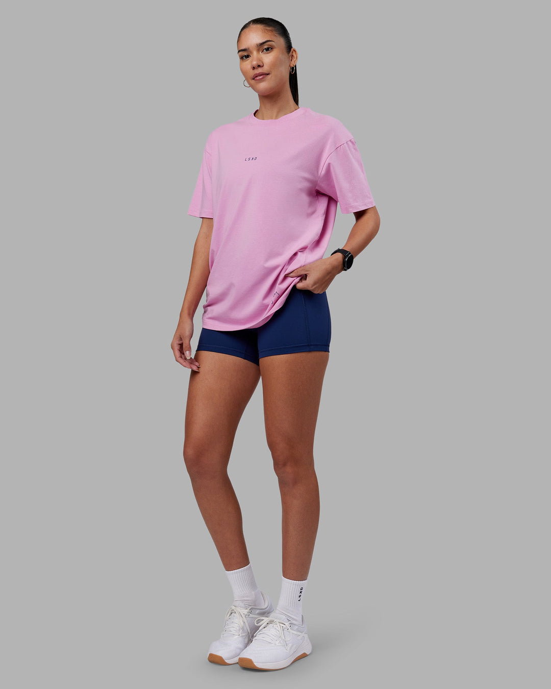 Woman wearing ETJ Values FLXCotton Oversize Tee - Bubblegum-Indigo | Model:Rhiley | Size:XS