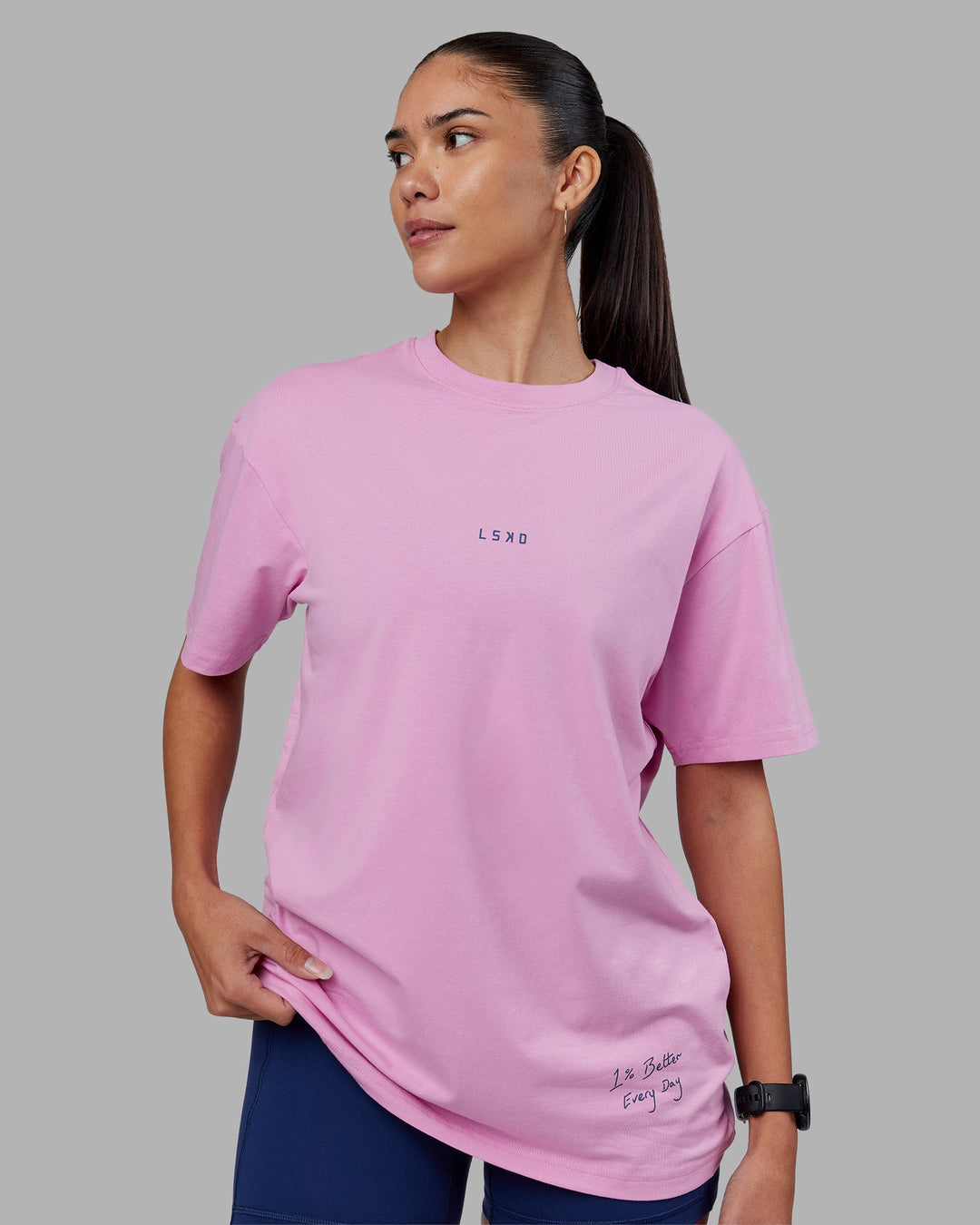 Woman wearing ETJ Values FLXCotton Oversize Tee - Bubblegum-Indigo | Model:Rhiley | Size:XS