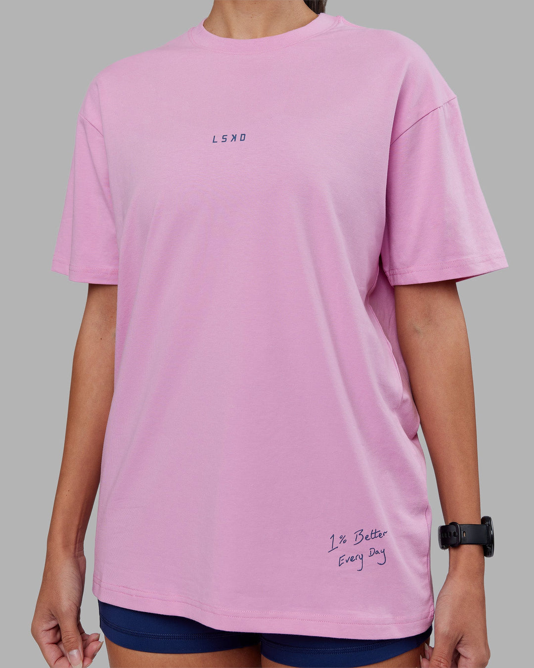 Woman wearing ETJ Values FLXCotton Oversize Tee - Bubblegum-Indigo | Model:Rhiley | Size:XS