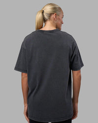 Woman wearing Easy FLXCotton Tee Oversize - Black Washed | Model:Katie | Size:XS