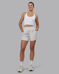 Woman wearing Elevate SoftTouch 4" Shorts - Clay-Clay