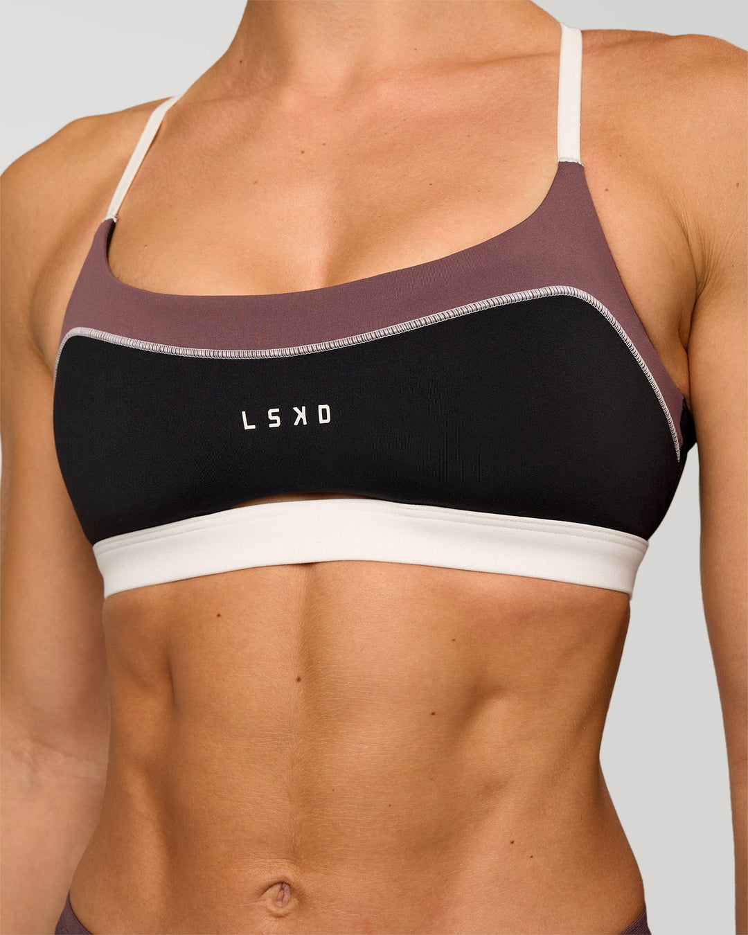 Man wearing Elevate Sports Bra - Black-Multi | Model:Maja | Size:XS - view 9