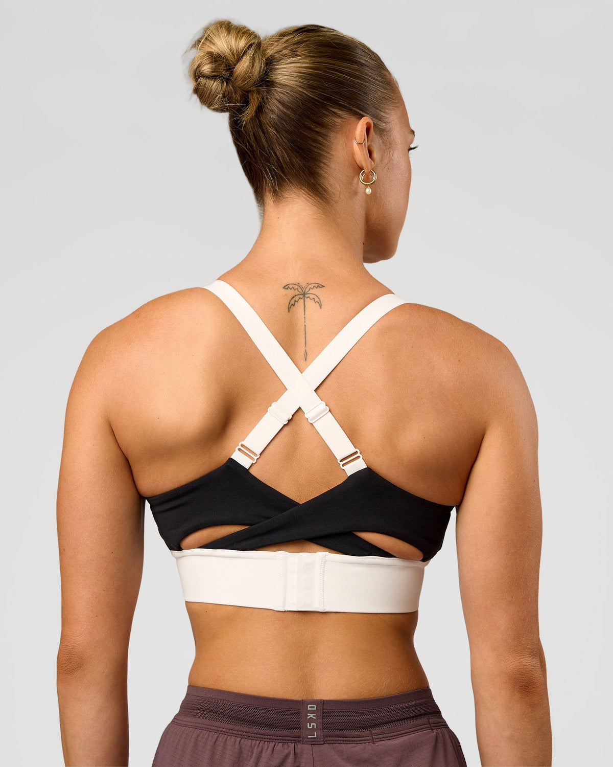 Woman wearing Elevated Accelerate Sports Bra - Black-Multi | Model:Maja | Size:XS - view 2