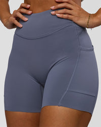 Woman wearing Elite Run High-Rise 5" Short Pockets - Night Shadow | Model:Brylee | Size:XS | Thumbnail Index: 8