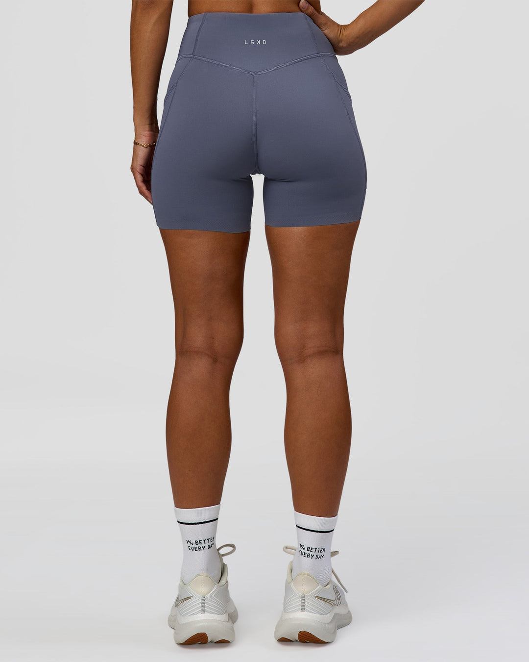 Woman wearing Elite Run High-Rise 5" Short Pockets - Night Shadow | Model:Brylee | Size:XS - view 5
