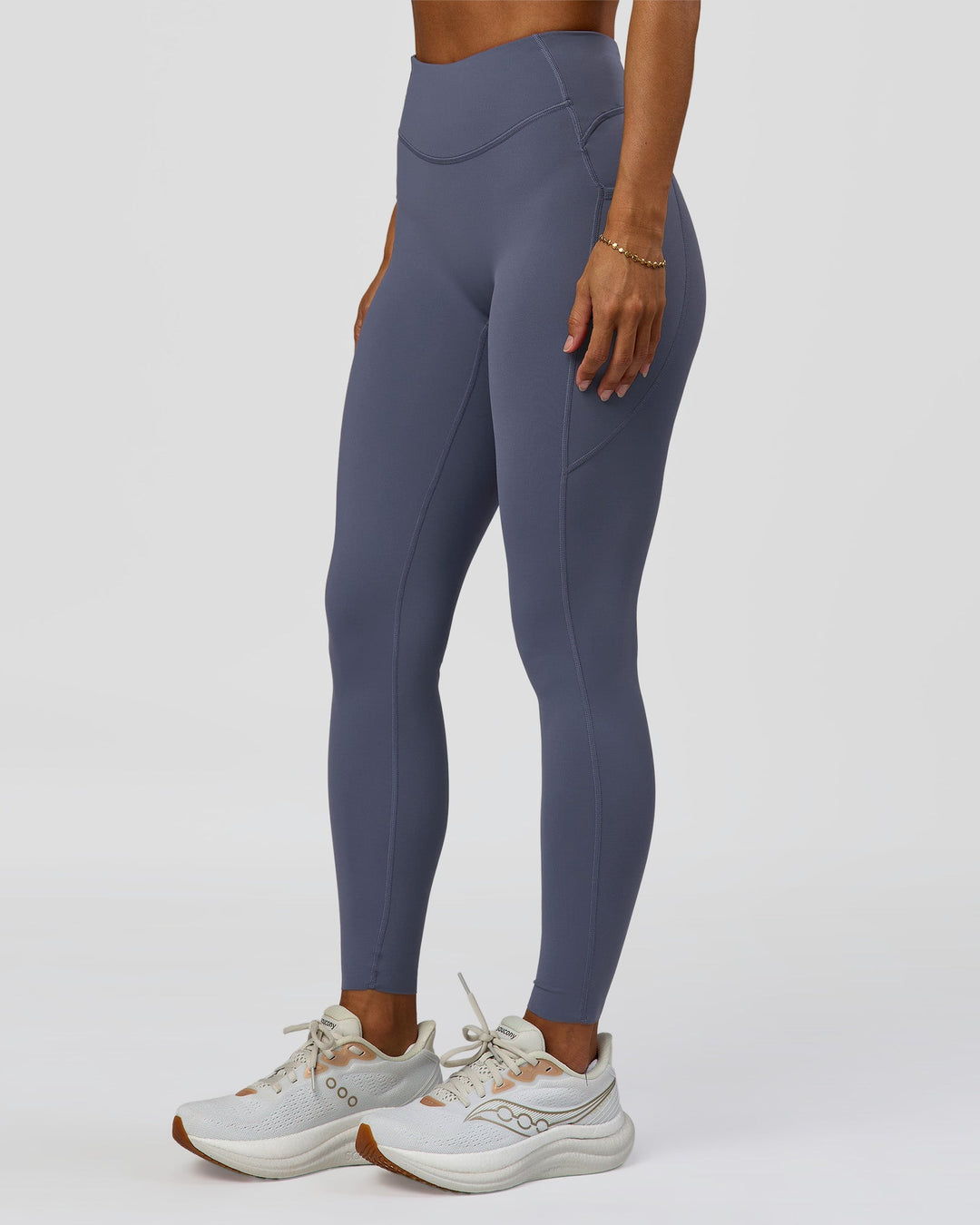 Woman wearing Elite Run High-Rise Full Length Legging Pockets - Night Shadow | Model:Brylee | Size:XS - view 7