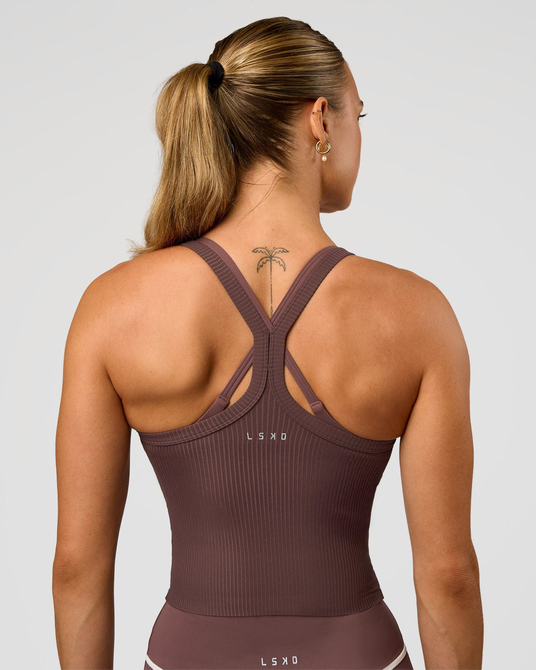 Woman wearing Flame Ribbed Tank - Cocoa Powder | Model:Maja | Size:XS