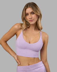 Woman wearing Flash Longline Sports Bra - Pale Lilac | Model:Leilani | Size:XS | Thumbnail Index: 1