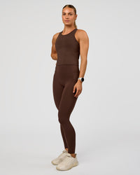 Woman wearing Flow Performance Tank 2.0 - Hot Chocolate | Model:Maja | Size:XS | Thumbnail Index: 1