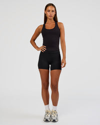 Woman wearing Flow Rib Scoop Neck Tank - Black | Model:Brylee | Size:XS | Thumbnail Index: 5