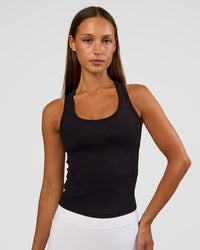 Woman wearing Flow Rib Scoop Neck Tank - Black | Model:Brylee | Size:XS | Thumbnail Index: 0