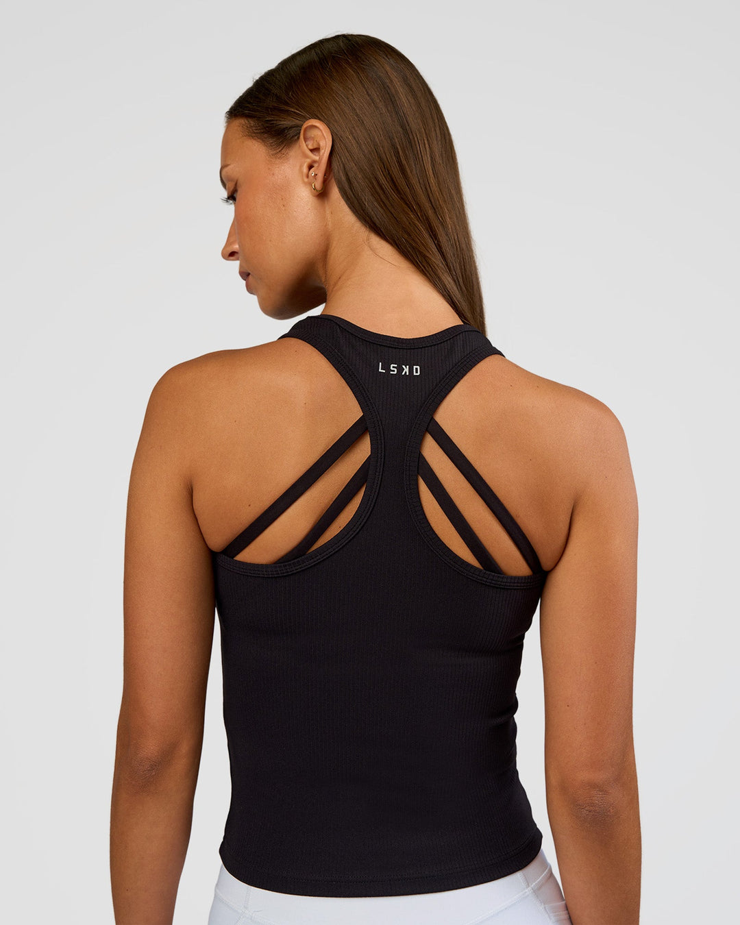Woman wearing Flow Rib Scoop Neck Tank - Black | Model:Brylee | Size:XS - view 3
