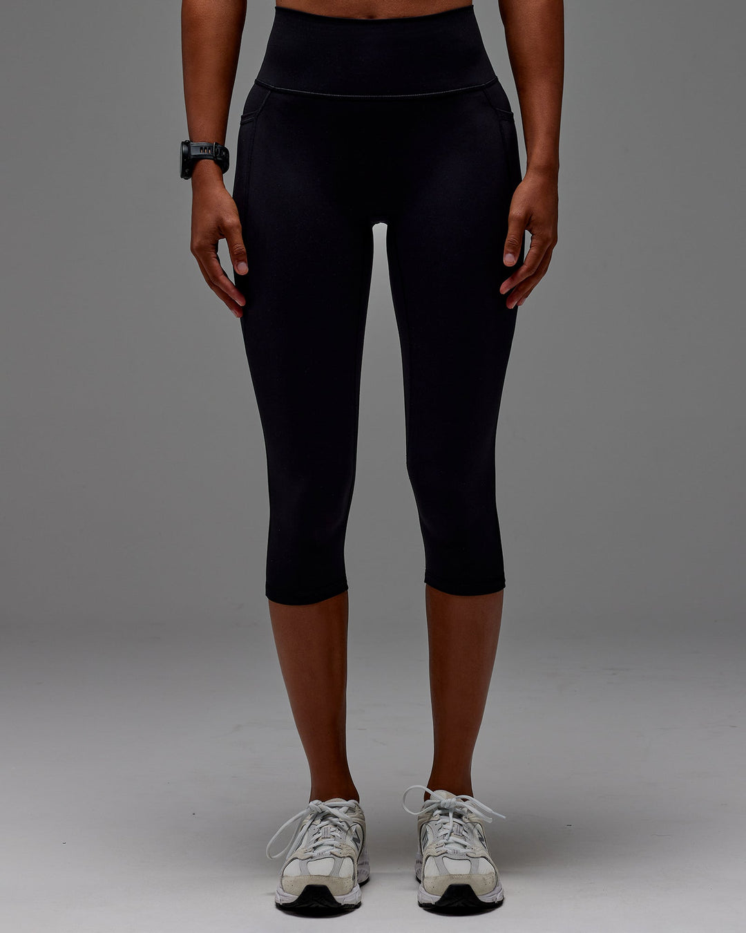 Woman wearing Fusion 3/4 Length Tight with Pockets in Black | Size:XS