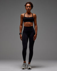 Woman wearing Fusion Ultra High-Rise Full Length Legging Pockets - Black | Model: Txai | Size:XS