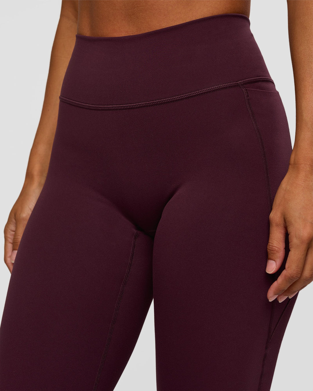 Woman wearing Fusion V-Contour High-Rise Flared Petite Legging Pockets - Cherry Lacquer | Model:Brylee | Size:XS - view 8