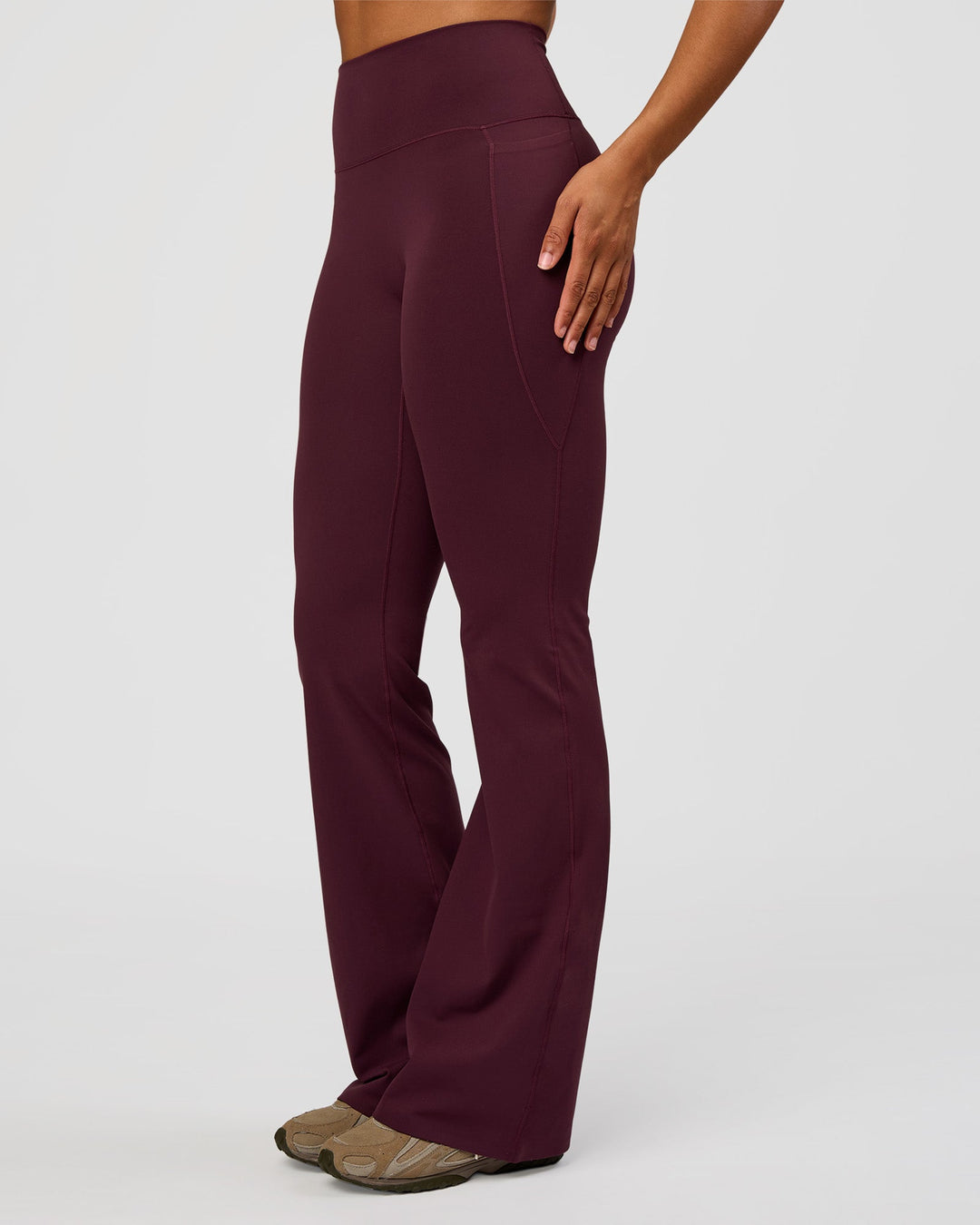 Woman wearing Fusion V-Contour High-Rise Flared Tall Legging Pockets - Cherry Lacquer | Model:Rosie | Size:S - view 4