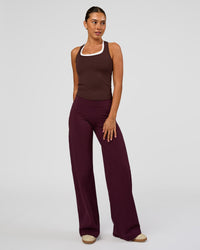Woman wearing Fusion V-Contour High-Rise Pant - Cherry Lacquer | Model:Charli | Size:XS