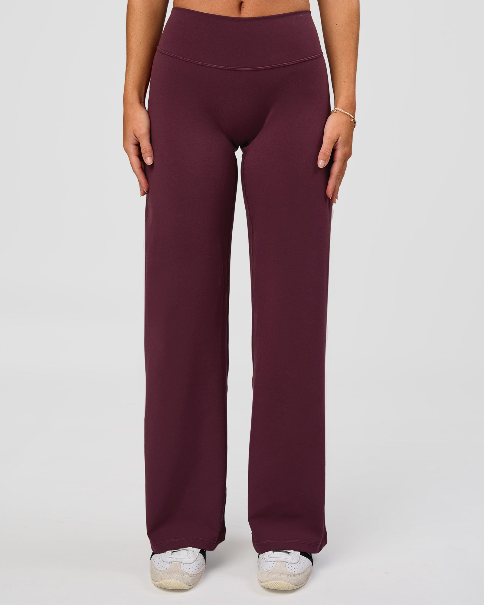 Woman wearing Fusion V-Contour High-Rise Petite Pant - Cherry Lacquer | Model:Issy | Size:XS