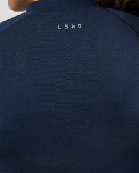 Woman wearing GG AeroFLX+ Long Sleeve Half Zip - Future Navy-Baltic Sea | Model:Grace | Size:XS | Thumbnail Index: 11