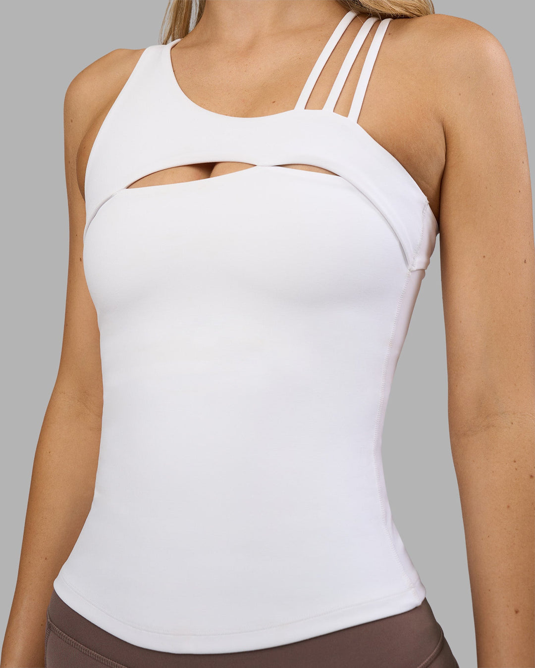 Woman wearing Galvanise Splice Shelf Bra Tank - White | Model:Leilani | Size:XS