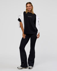 Woman wearing Go-To 1% Better Every Day FLXCotton Oversized Tee - Black-White | Model:Amity | Size:XS | Thumbnail Index: 2