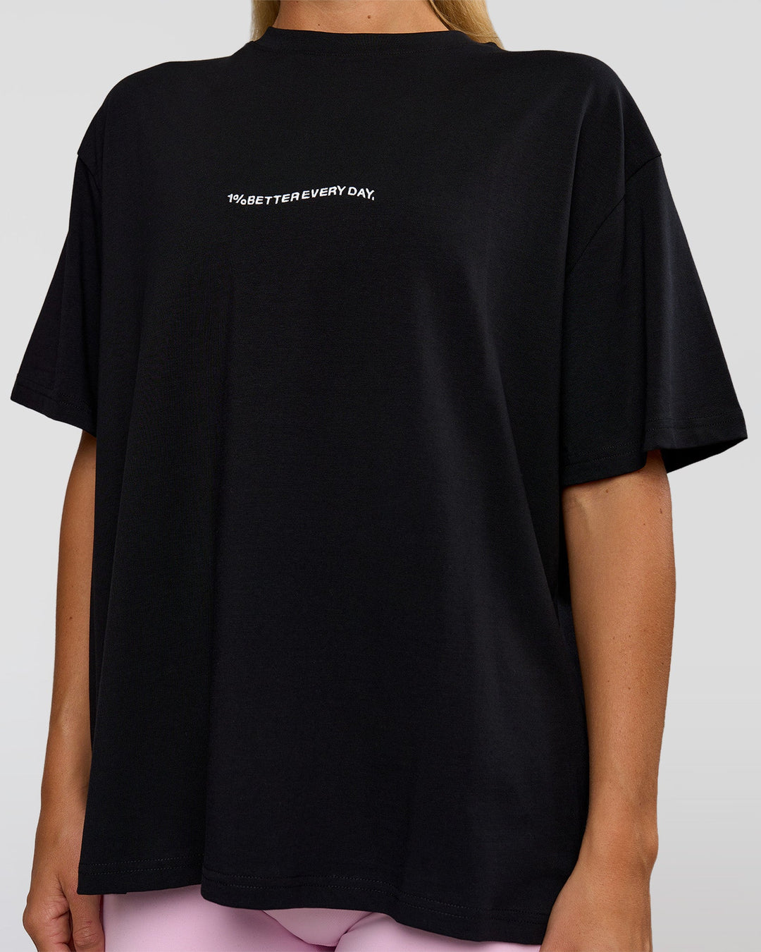 Woman wearing Go-To 1% Better Every Day FLXCotton Oversized Tee - Black-White | Model:Amity | Size:XS - view 6