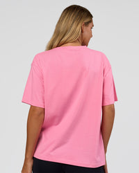 Woman wearing Go-To 1% Better Every Day FLXCotton Oversized Tee - Candy Pink-Black | Model:Amity | Size:XS | Thumbnail Index: 2
