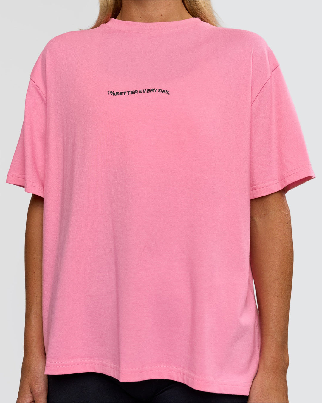Woman wearing Go-To 1% Better Every Day FLXCotton Oversized Tee - Candy Pink-Black | Model:Amity | Size:XS - view 4