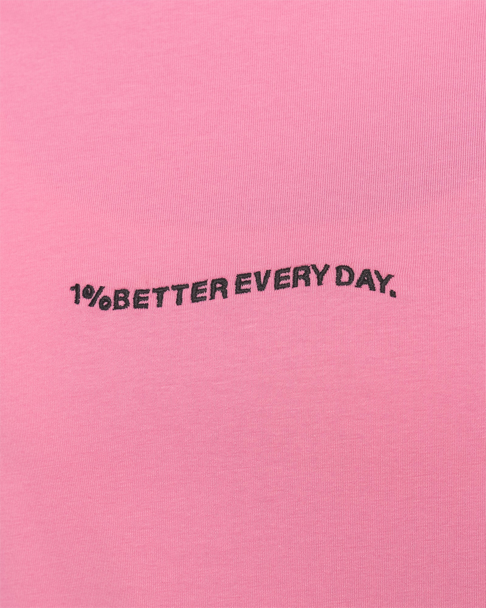 Woman wearing Go-To 1% Better Every Day FLXCotton Oversized Tee - Candy Pink-Black | Model:Amity | Size:XS