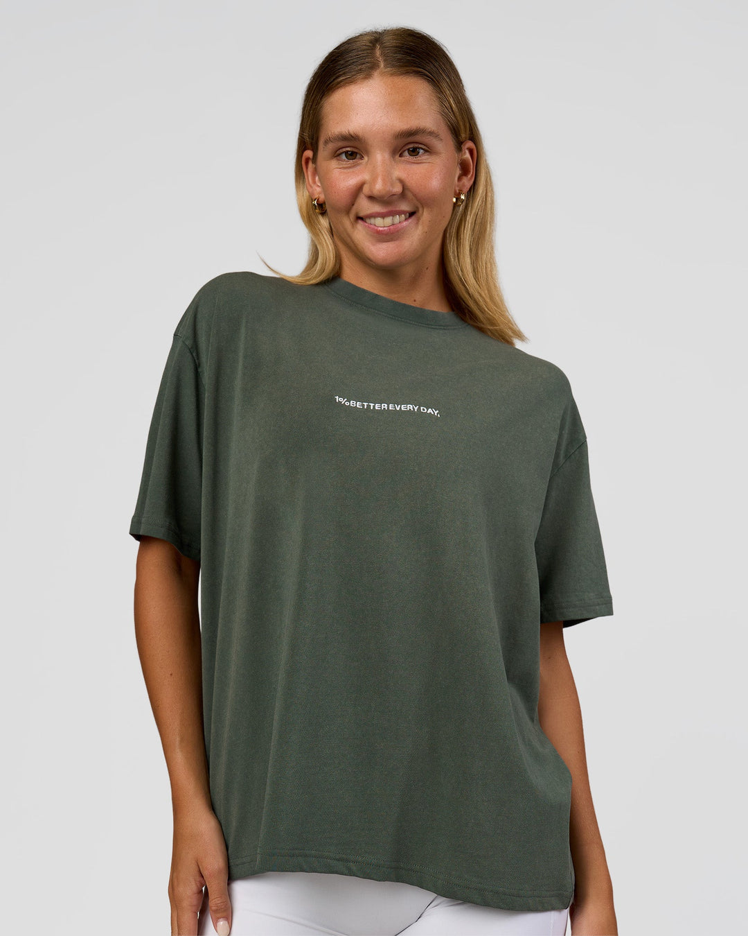 Woman wearing Go-To 1% Better Every Day FLXCotton Oversized Tee - Carbon Green Washed-White | Model:Amity | Size:XS - view 1