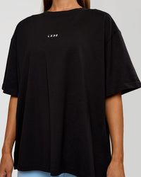 Woman wearing Go-To Break Through FLXCotton Oversized Tee - Black-Open Air | Model:Brylee | Size:XS | Thumbnail Index: 4