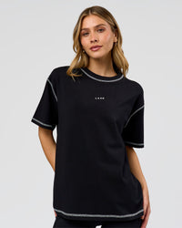 Woman wearing Go-To Contrast Oversized Heavyweight FLXCotton Tee - Black-White | Model:Leilani | Size:XS | Thumbnail Index: 0