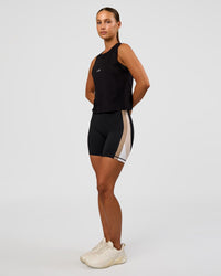 Woman wearing Go-To FLXCotton Midline Tank - Black-White | Model:Brylee | Size:XS | Thumbnail Index: 4