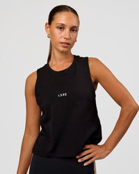 Woman wearing Go-To FLXCotton Midline Tank - Black-White | Model:Brylee | Size:XS | Thumbnail Index: 0