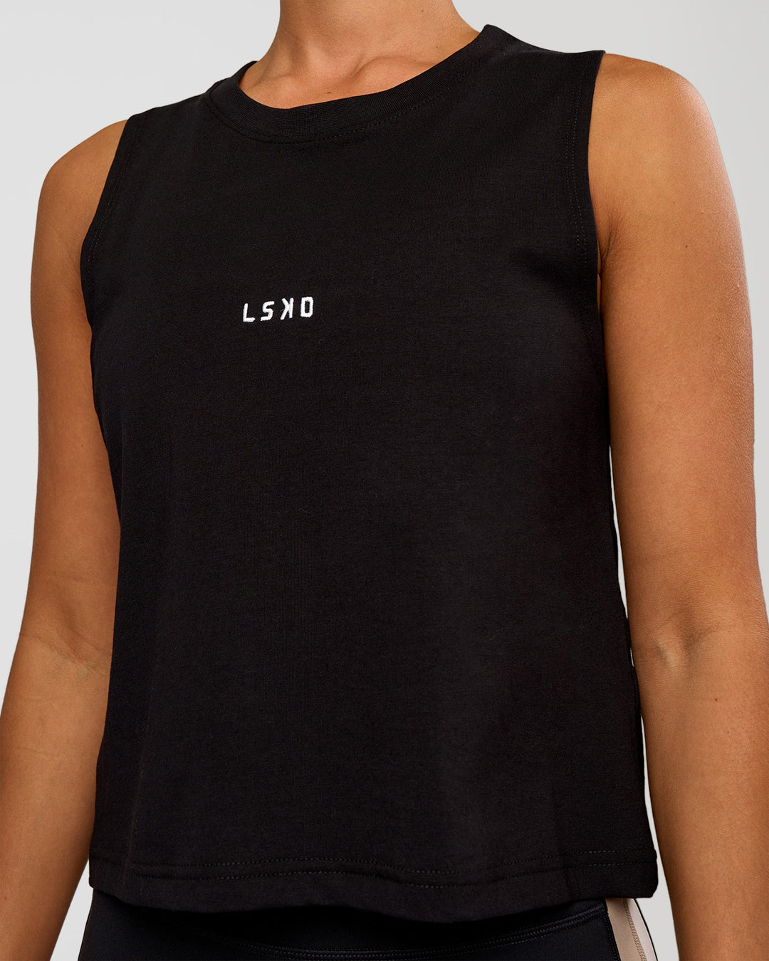 Woman wearing Go-To FLXCotton Midline Tank - Black-White | Model:Brylee | Size:XS - view 4