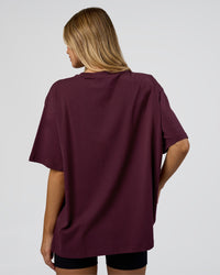 Woman wearing Go-To FLXCotton Oversized Tee - Cherry Lacquer-White | Model:Leilani | Size:XS | Thumbnail Index: 2
