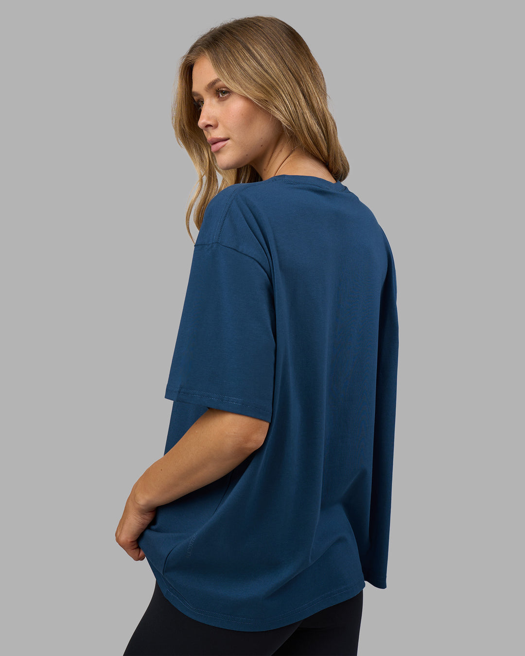 Woman wearing Go-To FLXCotton Oversized Tee - Indigo-White | Model:Leilani | Size:XS