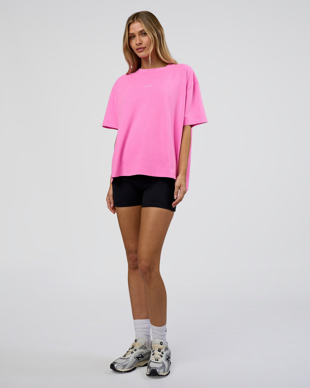 Woman wearing Go-To FLXCotton Oversized Tee - Ultra Fuchsia Washed | Model:Leilani | Size:XS
