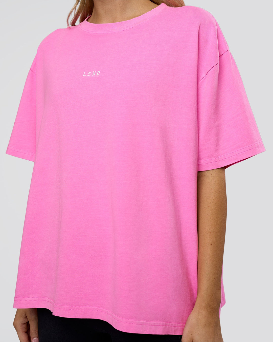 Woman wearing Go-To FLXCotton Oversized Tee - Ultra Fuchsia Washed | Model:Leilani | Size:XS