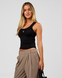 Woman wearing Go-To FLXCotton Scoop Neck Tank in Black-White | Model:Issy | Size:XS
