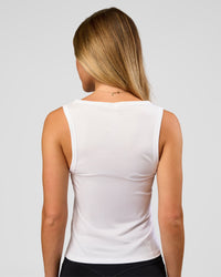 Woman wearing Go-To FLXCotton Scoop Neck Tank in White-Black | Model:Issy | Size:XS