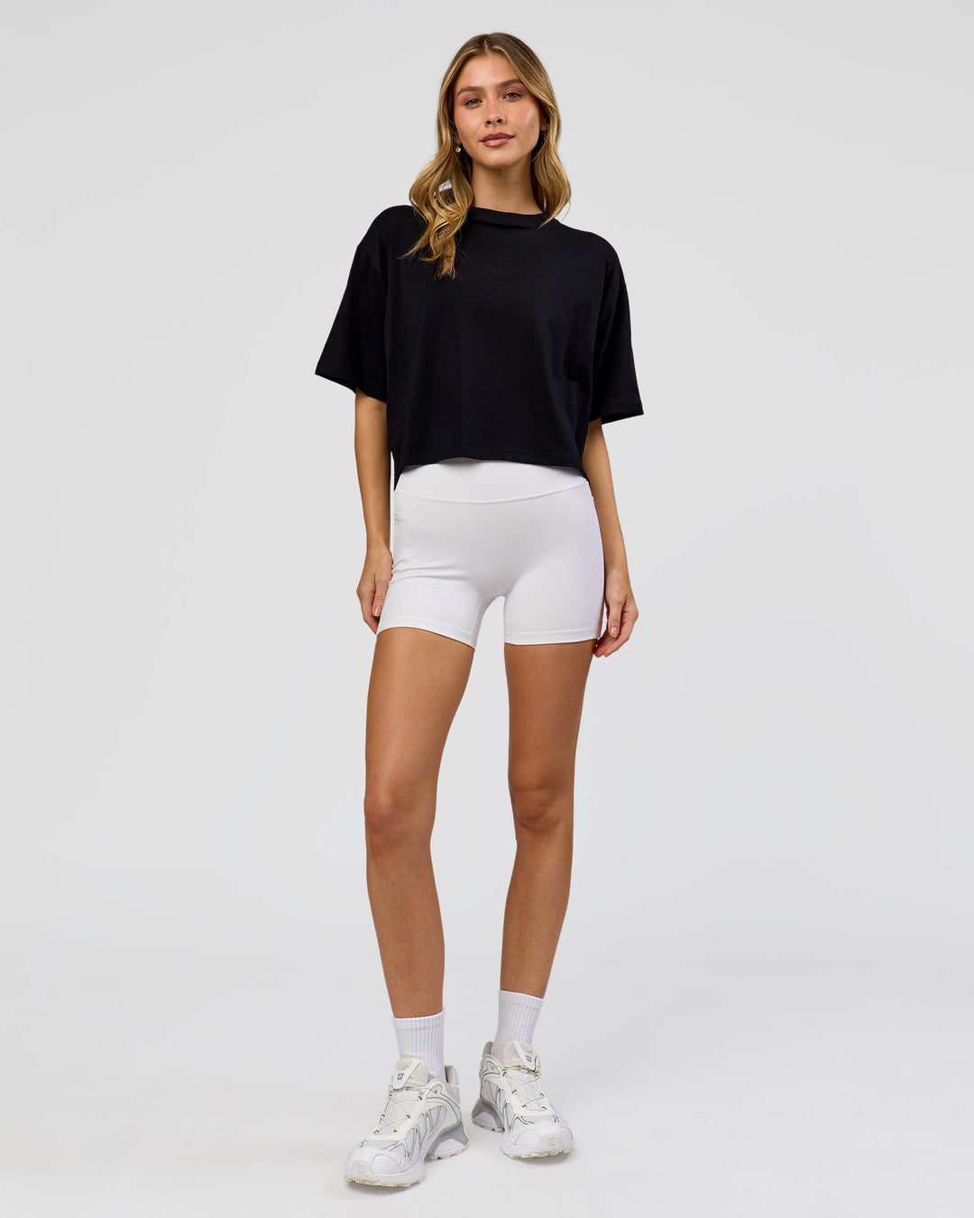 Woman wearing Go-To FLXCotton Skimmer Tee - Black-Black | Model:Leilani | Size:XS - view 2