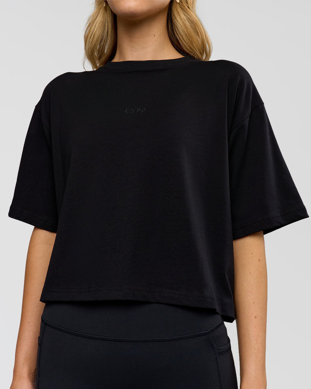 Woman wearing Go-To FLXCotton Skimmer Tee - Black-Black | Model:Leilani | Size:XS - view 5
